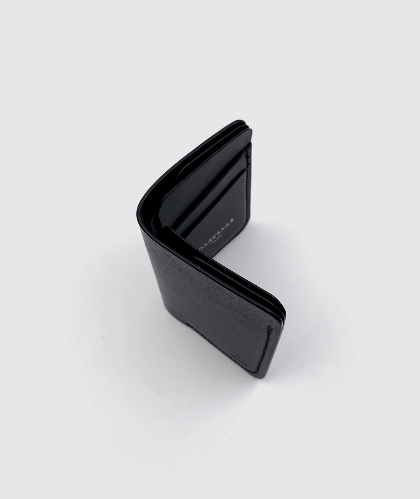Portefeuille minimaliste en cuir noir