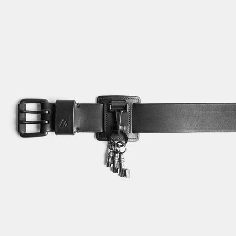 Belt keychain full view showing leather attachment and belt buckle