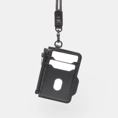 Porte-cartes cuir noir suspendu à un cordon paracorde tour de cou