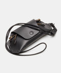 Étui à lunettes cuir noir à clipser sur un sac