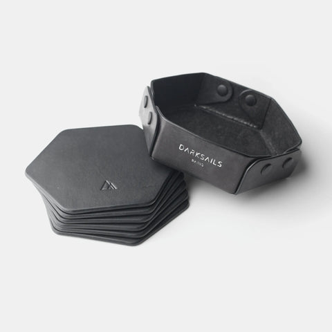Dessous de verre cuir hexagonaux noirs avec étui de rangement assorti