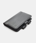Handmade black leather notebook cover closed with pen loop detail