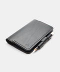Black leather notebook cover side view with pen holder full-grain leather