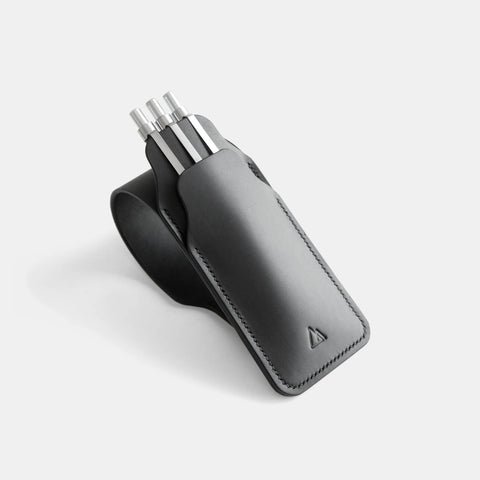 Black leather pen case handmade with full-grain leather holding three pens