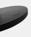 Black mousepad leather embossed branding detail and burnished edges