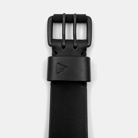 Brass double prong belt buckle with textured center bar detail