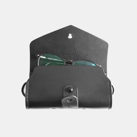 Eyeglass case interior showing soft leather lining protecting lenses from scratches