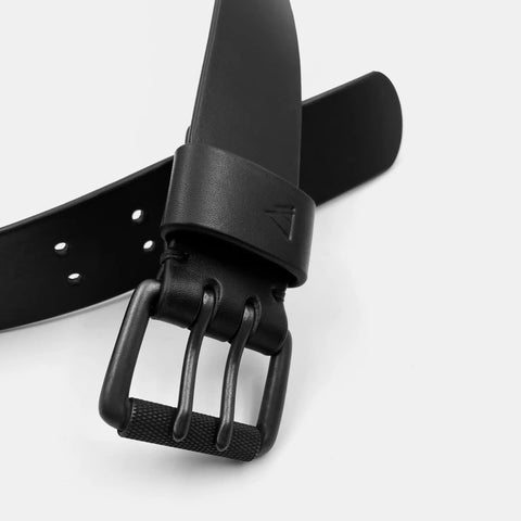 Handmade leather belt buckle area with embossed brand logo