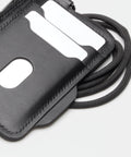 Porte-cartes cuir fait main montrant le point sellier artisanal
