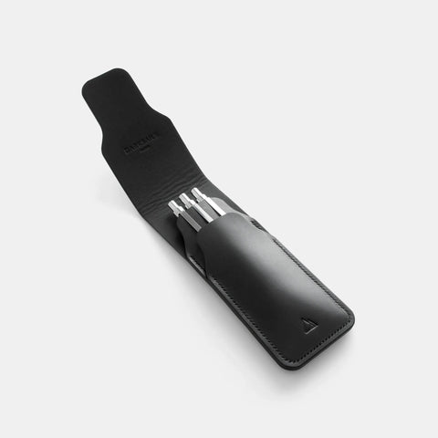 Black leather pen case showing hand-burnished edges and saddle stitch craftsmanship