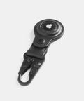 Leather AirTag keychain side view showing snap hook attachment