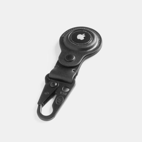 Leather AirTag keychain side view showing snap hook attachment