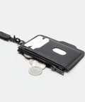 Porte-cartes cuir poche zippée ouverte avec pièces de monnaie