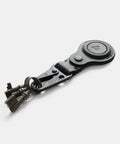 Leather AirTag keychain attached to vintage keys showing practical use