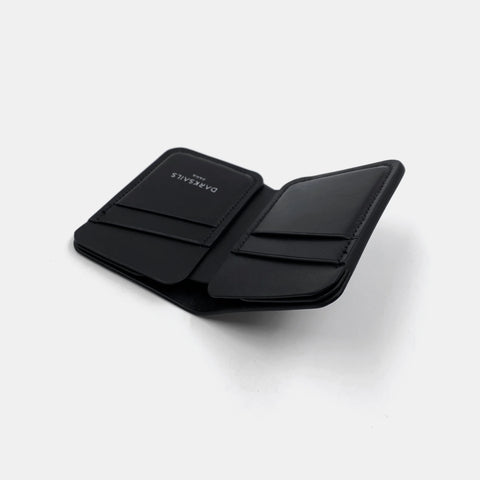 Men's black leather wallet interior with card pockets and storage