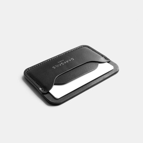 Black card holder showing multiple pockets in vegetable tanned leather